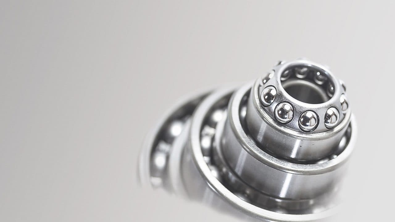 Metal cylinder with ball bearings in