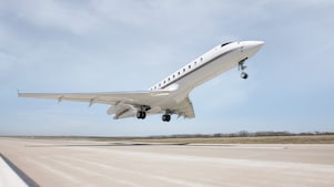 Jet plane taking off from a runway at an airport