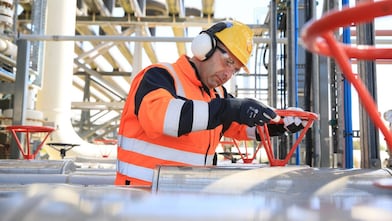 Engineer working on a pipeline