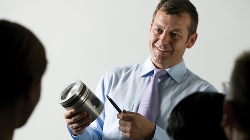 man presenting at a meeting